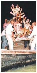 Bathing the goddess in the Buriganga river