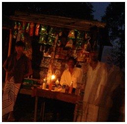 Small lights in shops alongside the road